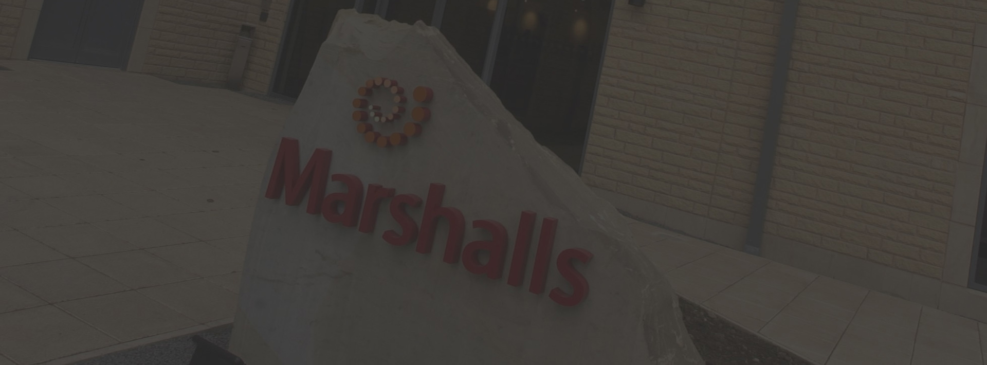 Sign at the front of the Marshalls office with the Marshalls logo on it 