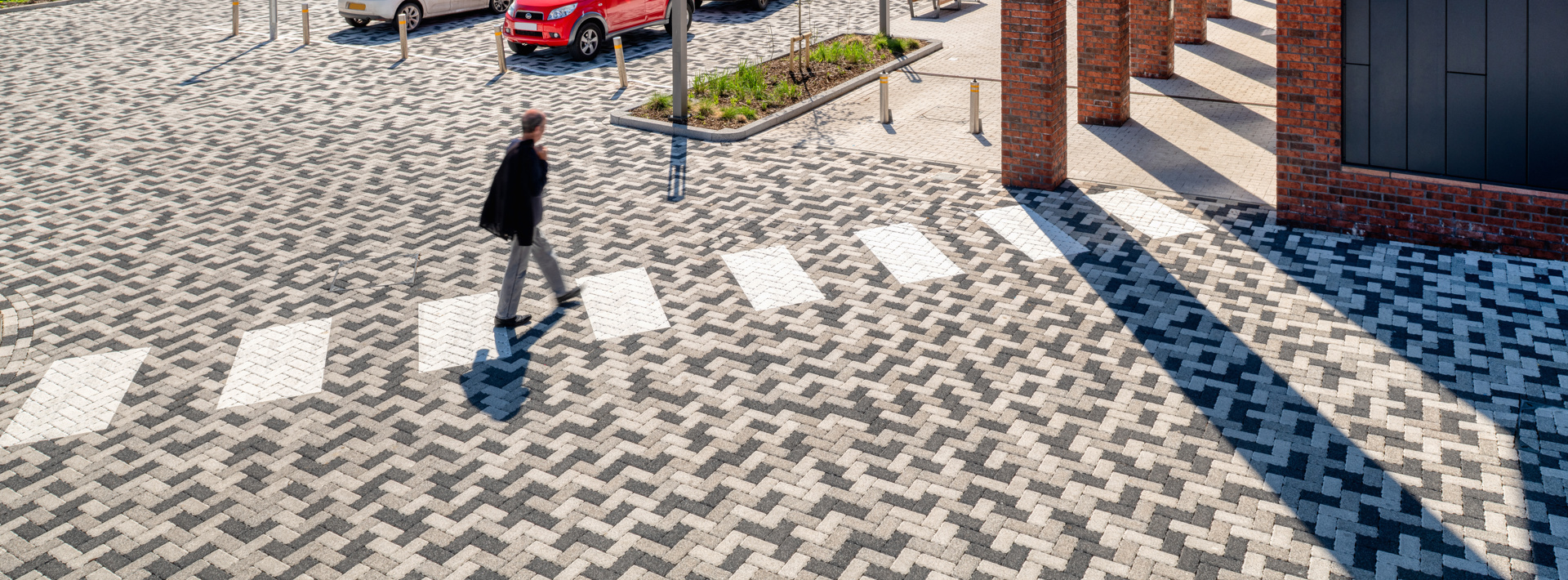 Marshalls Modal Priora laid at the Chard leisure centre with cars parked over it