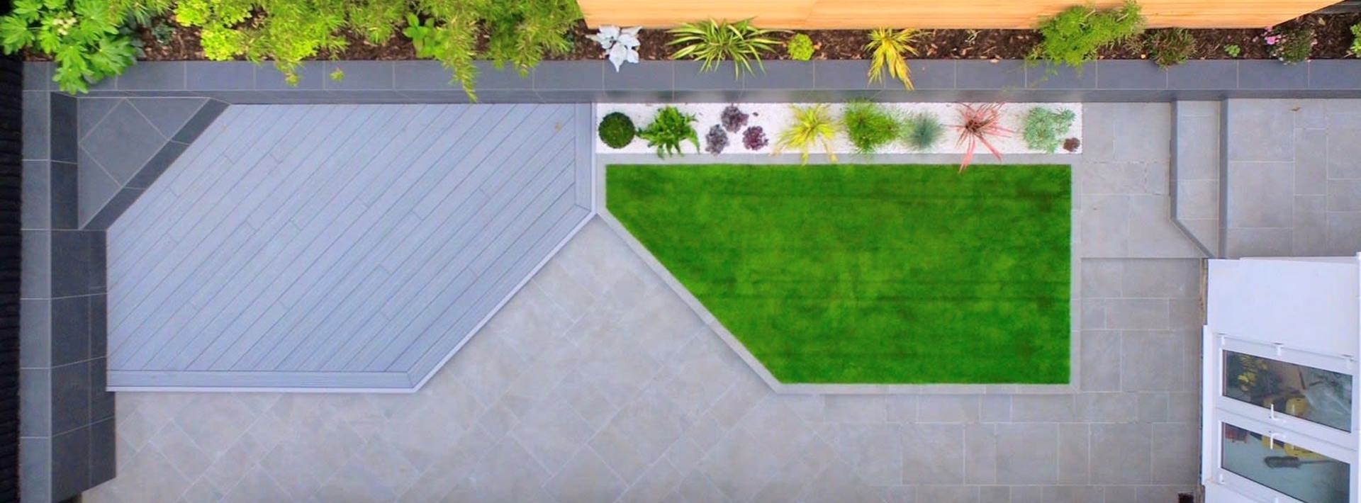 Birdseye view of a modern garden with Marshalls Arrento silver paving and a small seating area 